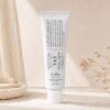 Dr. Althea 345 Relief Cream 50 ml présentée sur un fond beige minimaliste.